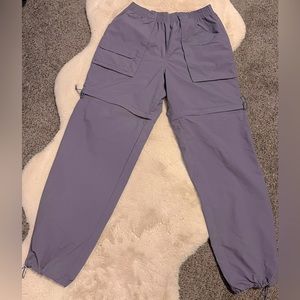 Purple cargo pants, with zip away bottoms